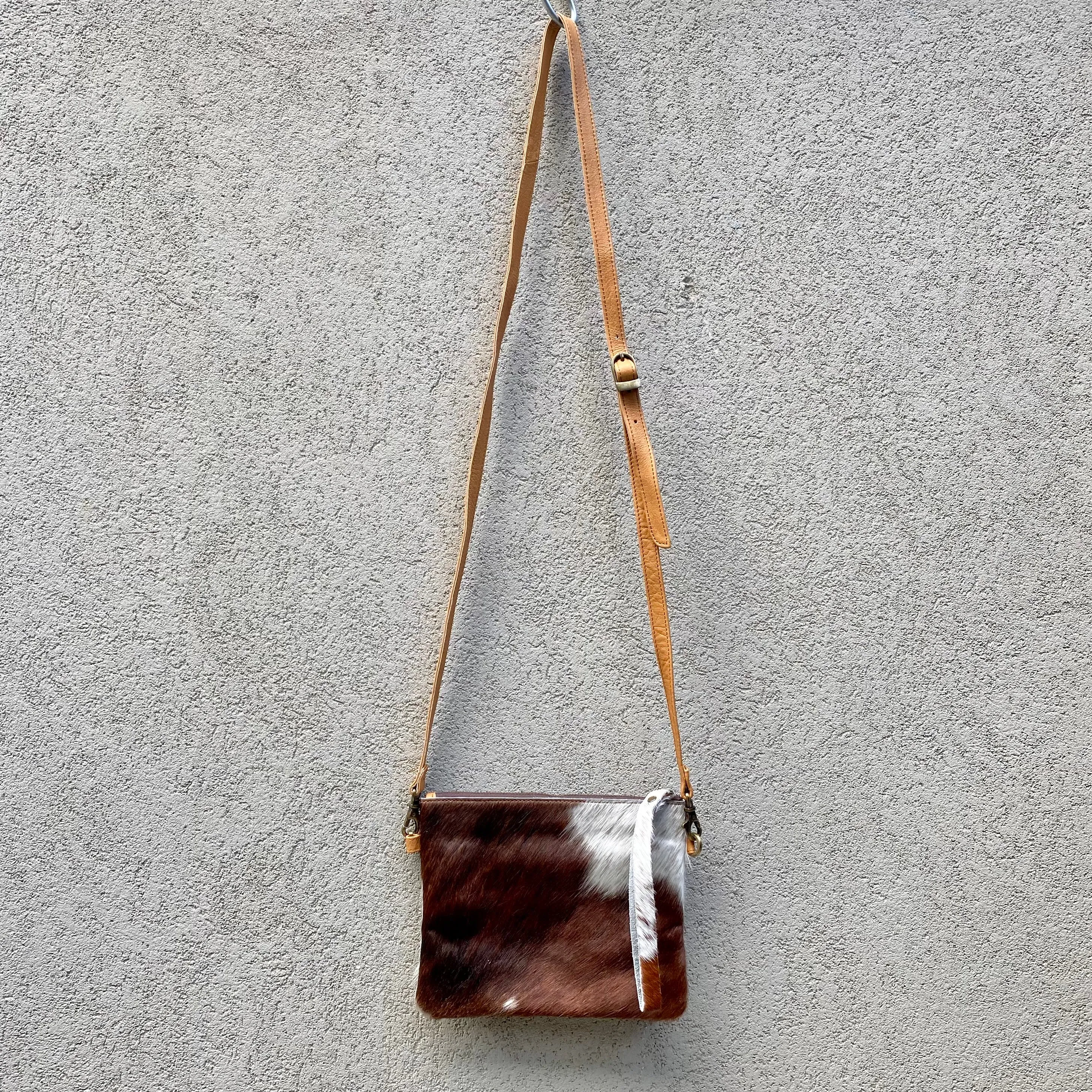 Bella Cowhide Crossbody Clutch Bag - Dark Tan White